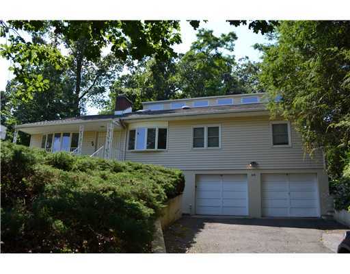 a view of a house with a garden