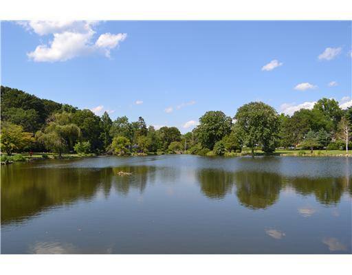 58 Arch Street Riverside, CT 06878 - Photo 12 of 13 a view of a lake with houses in the back