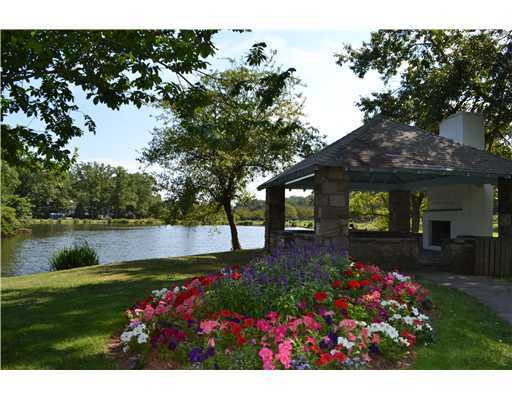 58 Arch Street Riverside, CT 06878 - Photo 13 of 13 a view of a house with a big yard