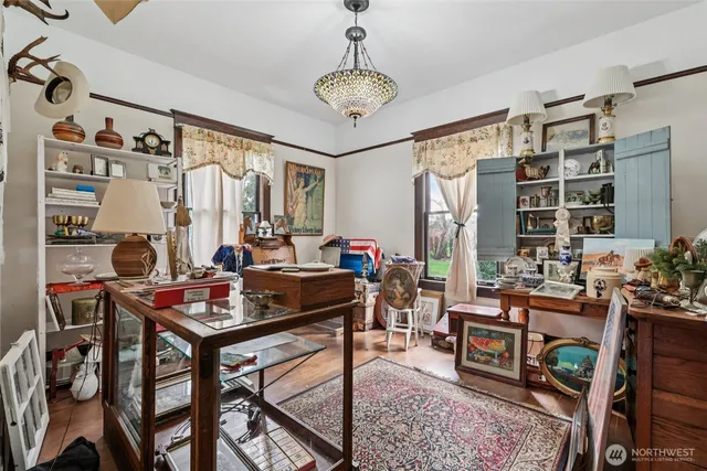 a workspace with furniture and rug