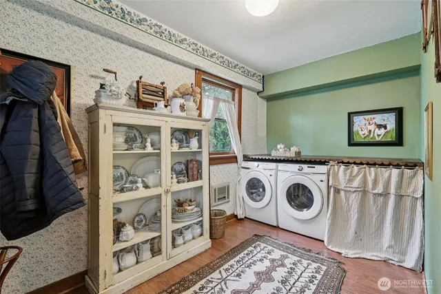 a utility room with dryer and washer