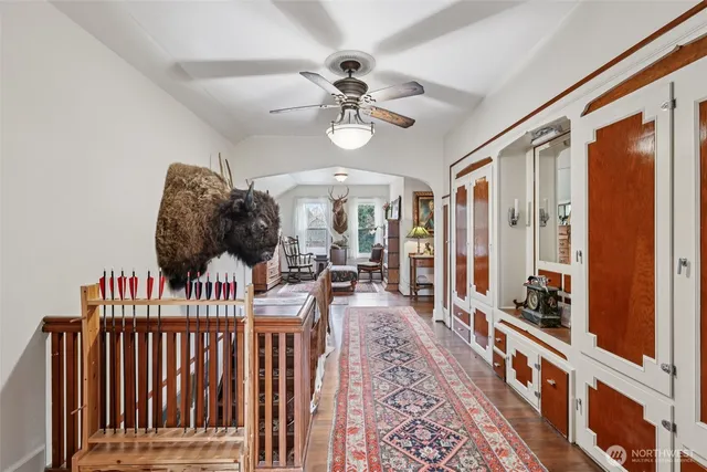 a view of living room kitchen and entryway