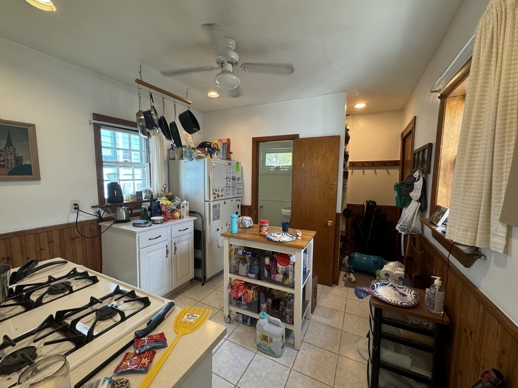 41 Alpine Street Somerville, MA 02144 - Photo 18 of 25 a kitchen that has a lot of cabinets in it