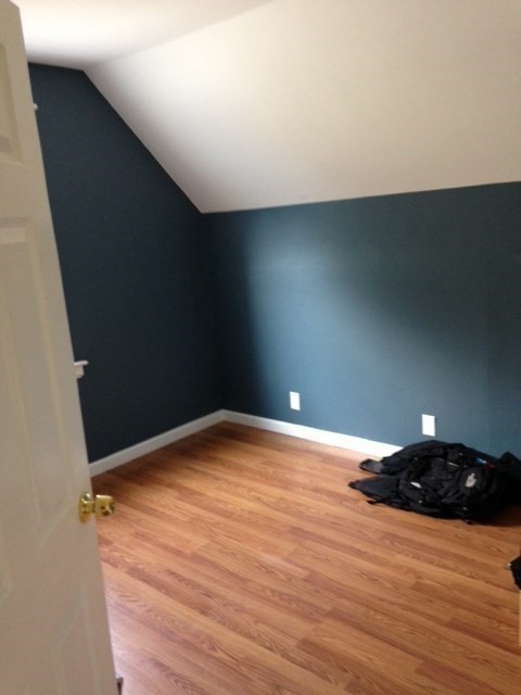 41 Alpine Street Somerville, MA 02144 - Photo 6 of 25 a view of an empty room with wooden floor