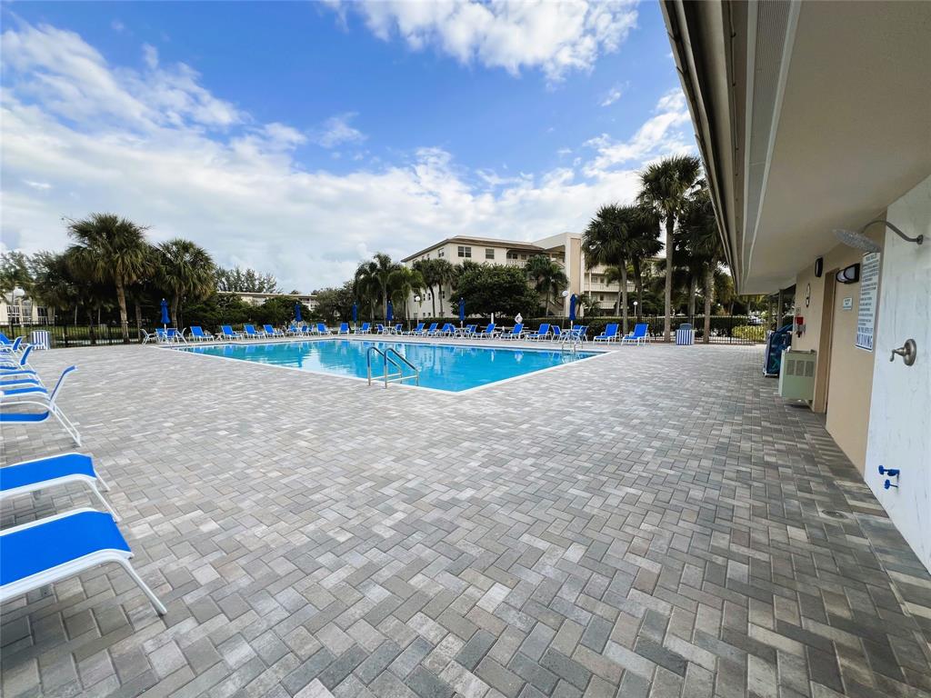 1902 Bermuda Circle, Unit H2 Coconut Creek, FL 33066 - Photo 23 of 32 a view of an outdoor space and tennis court