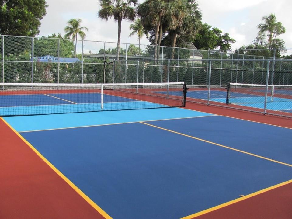 1902 Bermuda Circle, Unit H2 Coconut Creek, FL 33066 - Photo 28 of 32 a view of a tennis court