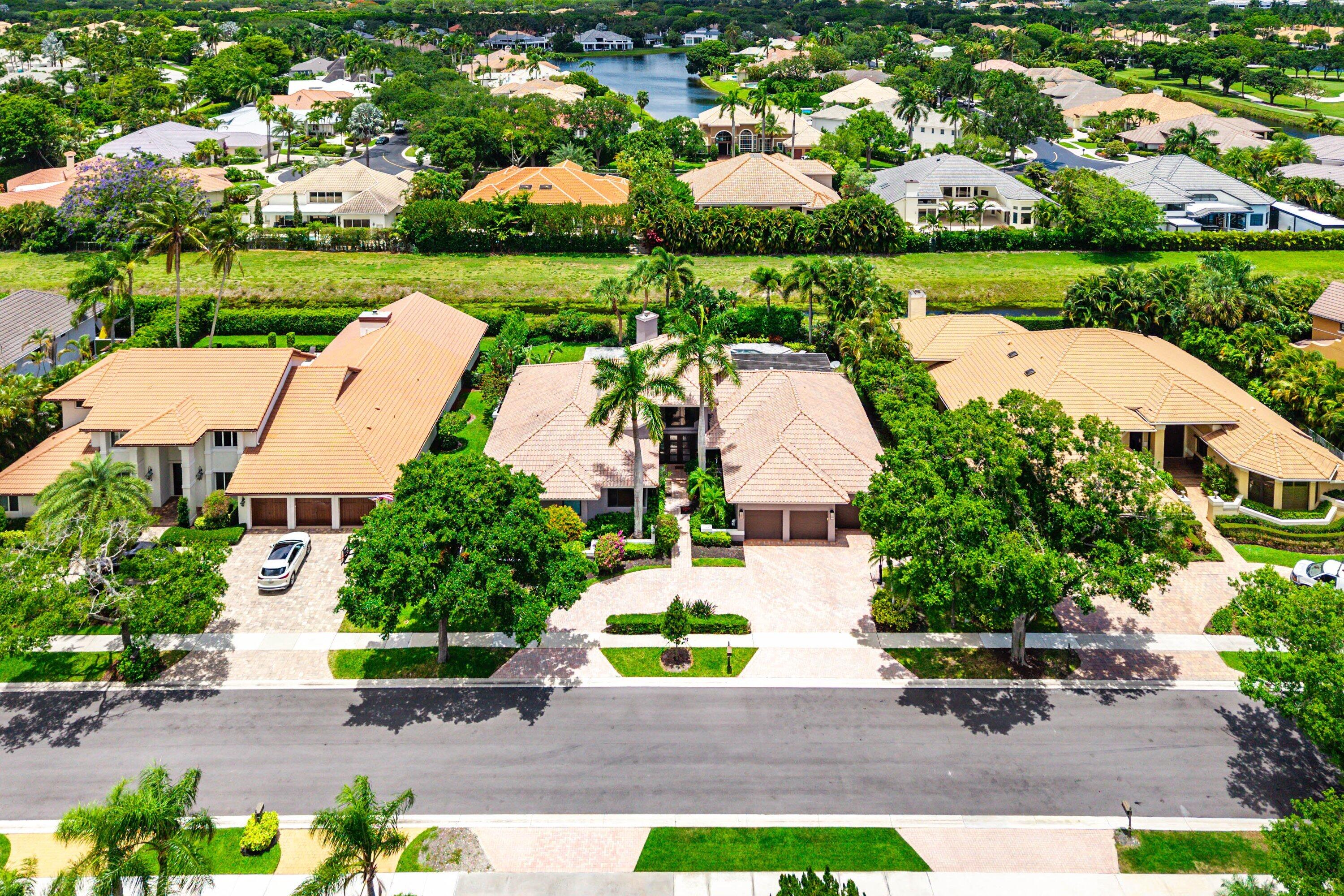2357 Northwest 59th Street Boca Raton, FL 33496 - Photo 55 of 88 an aerial view of a house with a garden and plants