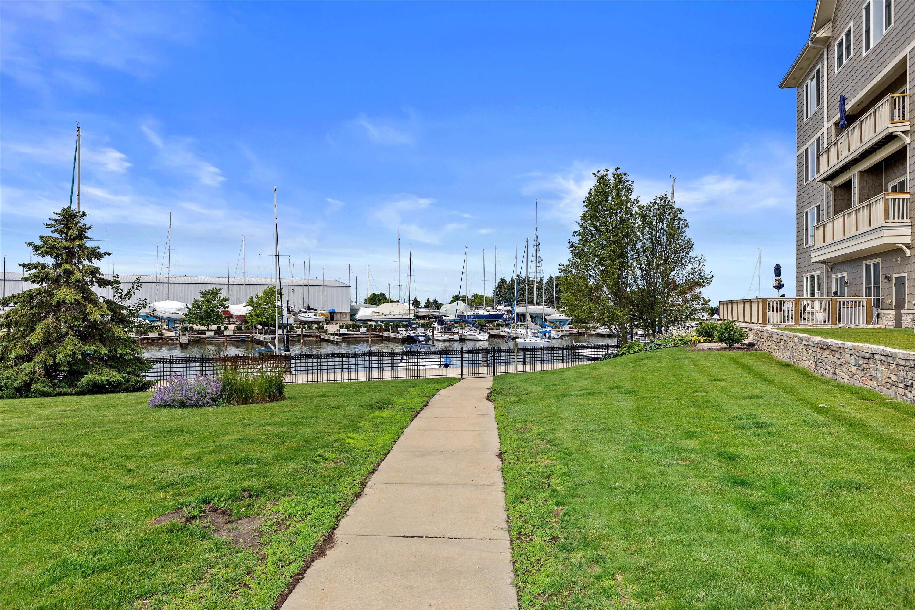 4 Gas Light Drive, Unit 111 Racine, WI 53403 - Photo 28 of 31 Walkway to the Water