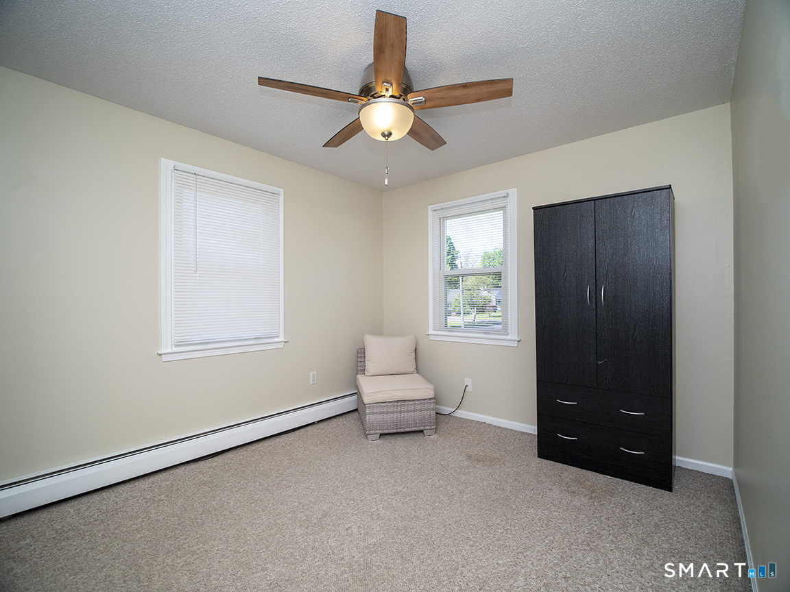 82 Wilcox Road Middletown, CT 06457 - Photo 22 of 27 a living room with furniture and a window