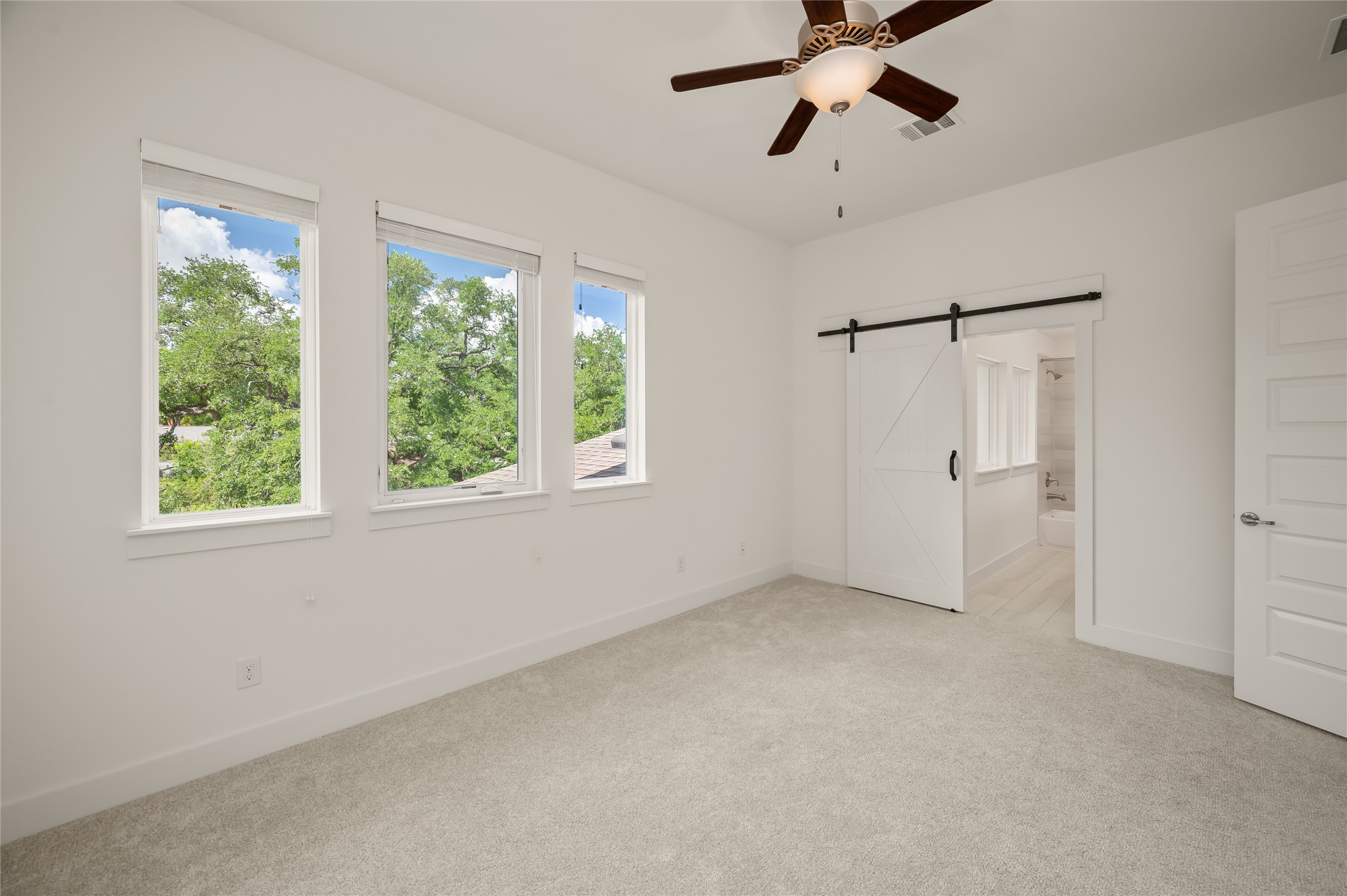 2215 MacArthur Street Houston, TX 77030 - Photo 21 of 33 This is the Third Bedroom. This suite faces north and offers tree top views,