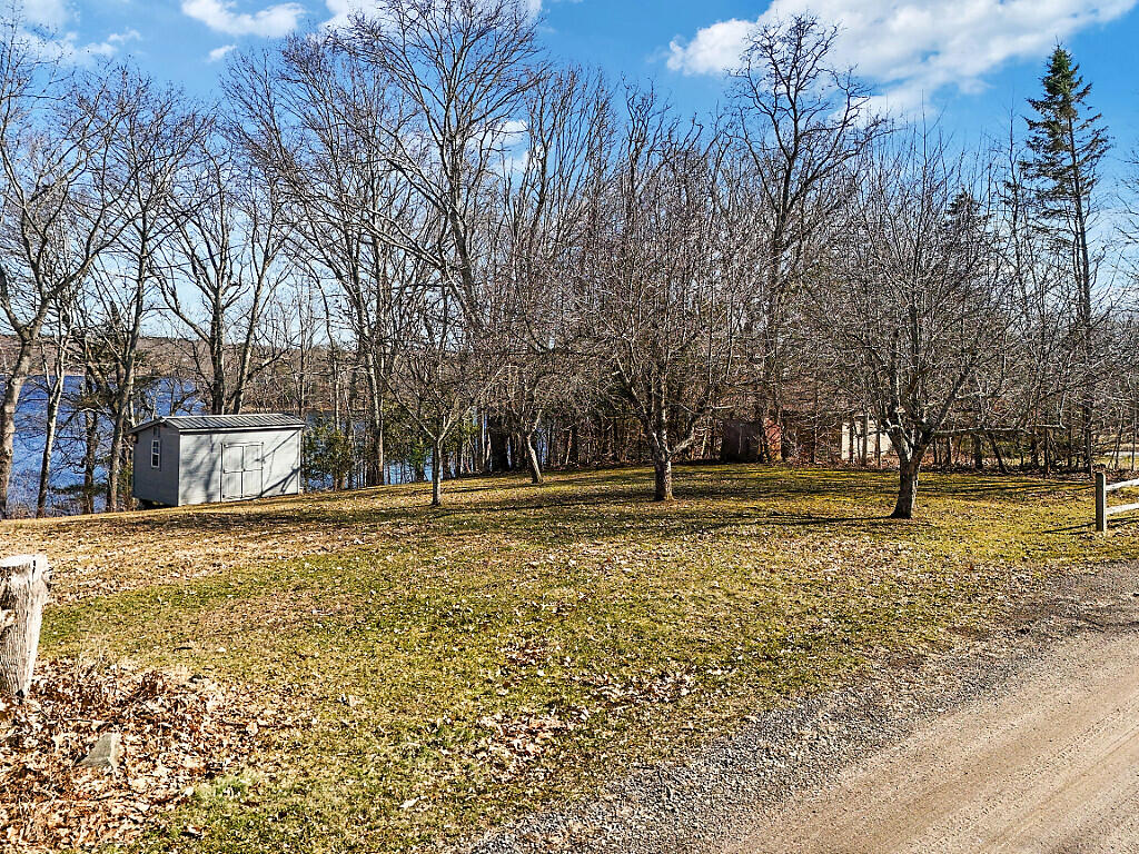 44 7th Fire Road China, ME 04358 - Photo 53 of 68 Side Yard With Fruit Trees Shed