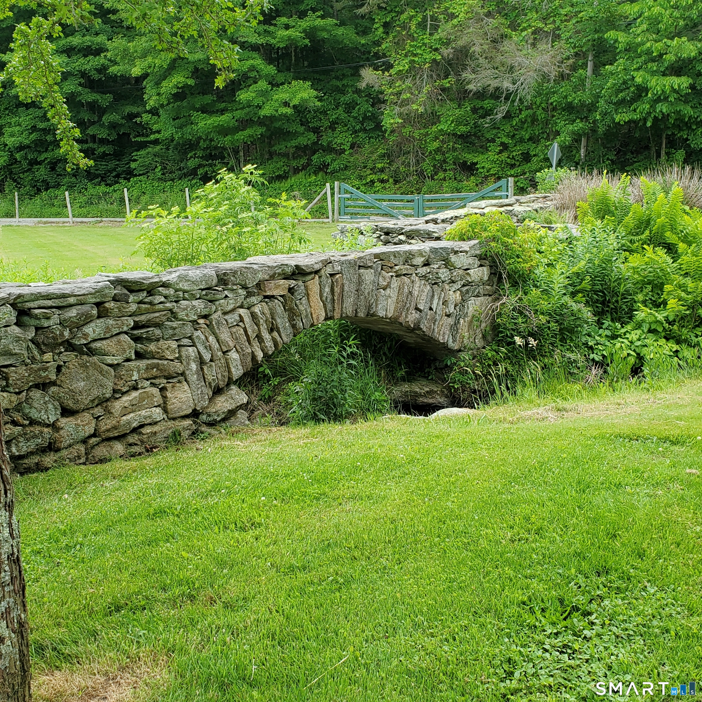 24 Ayer Road Franklin, CT 06254 - Photo 14 of 15 One of two stone bridges over the brook that meanders through the property.
