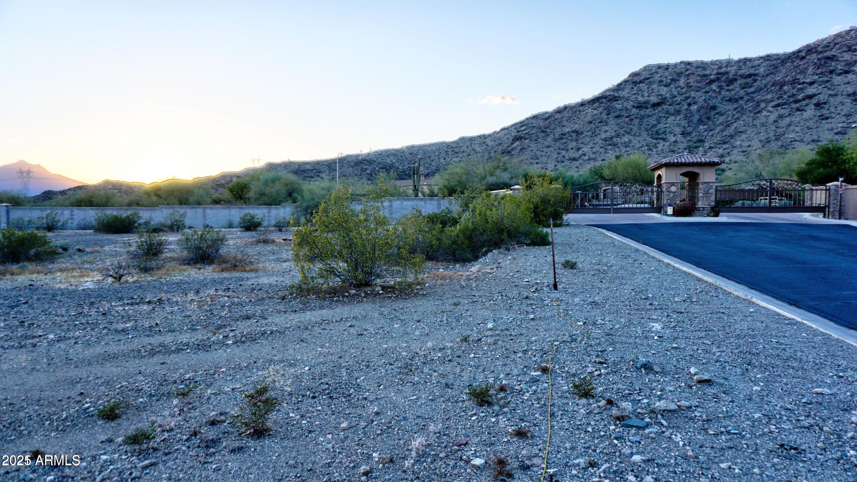 16722 South 32nd Lane, Unit 68 Phoenix, AZ 85045 - Photo 6 of 9 a view of a backyard with barn
