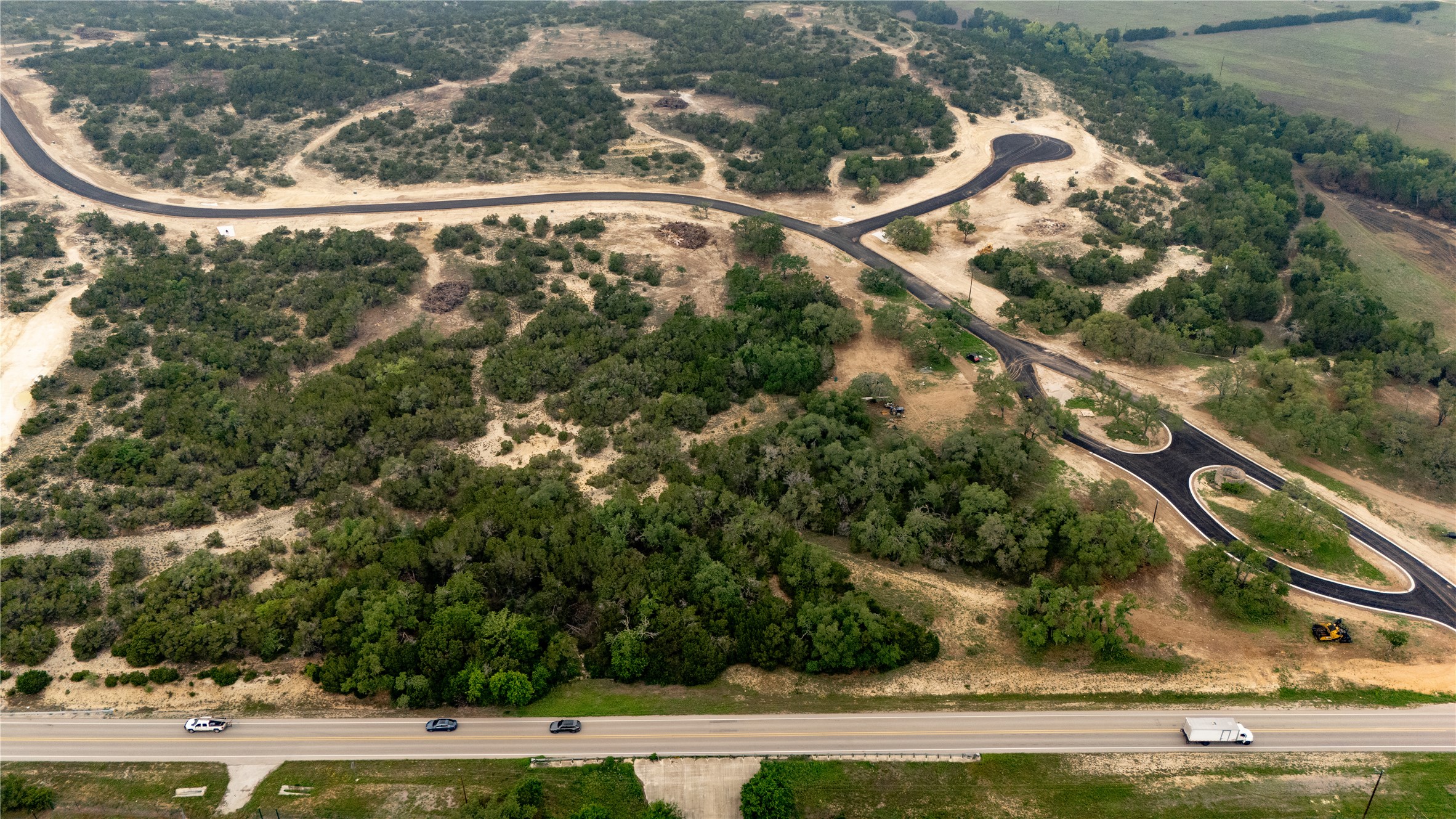 Lot 2 Ranch Road 165 Dripping Springs, TX 78620 - Photo 7 of 13 an aerial view of residential houses with outdoor space and swimming pool