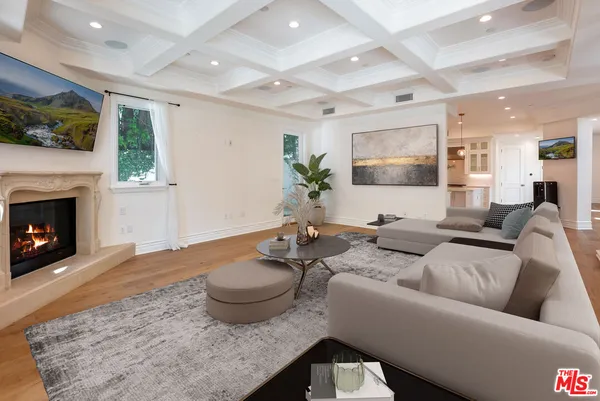 a projector room with hard wood flooring
