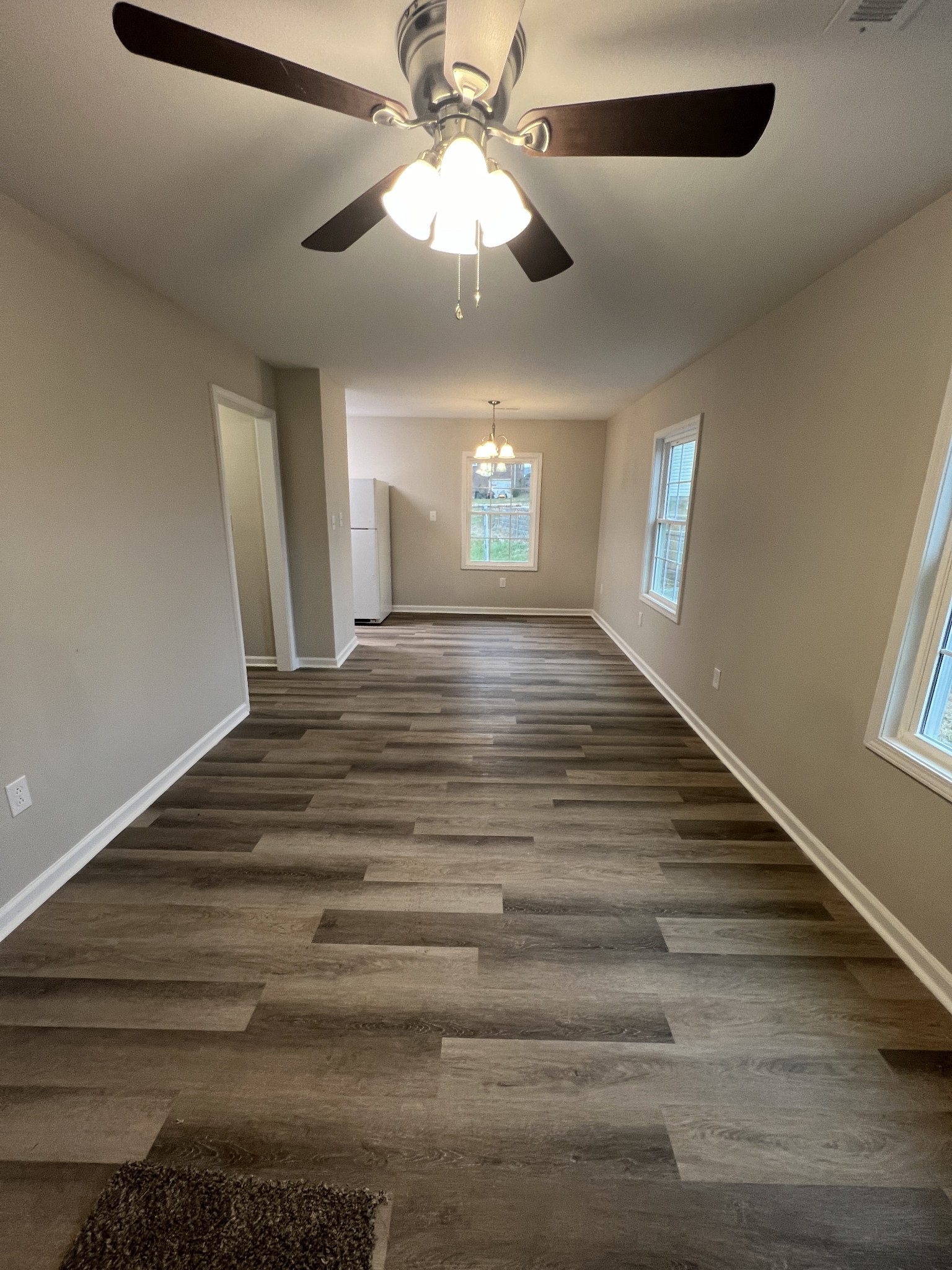 213 Notgrass Road Clarksville, TN 37042 - Photo 2 of 12 a view of empty room with window and ceiling fan