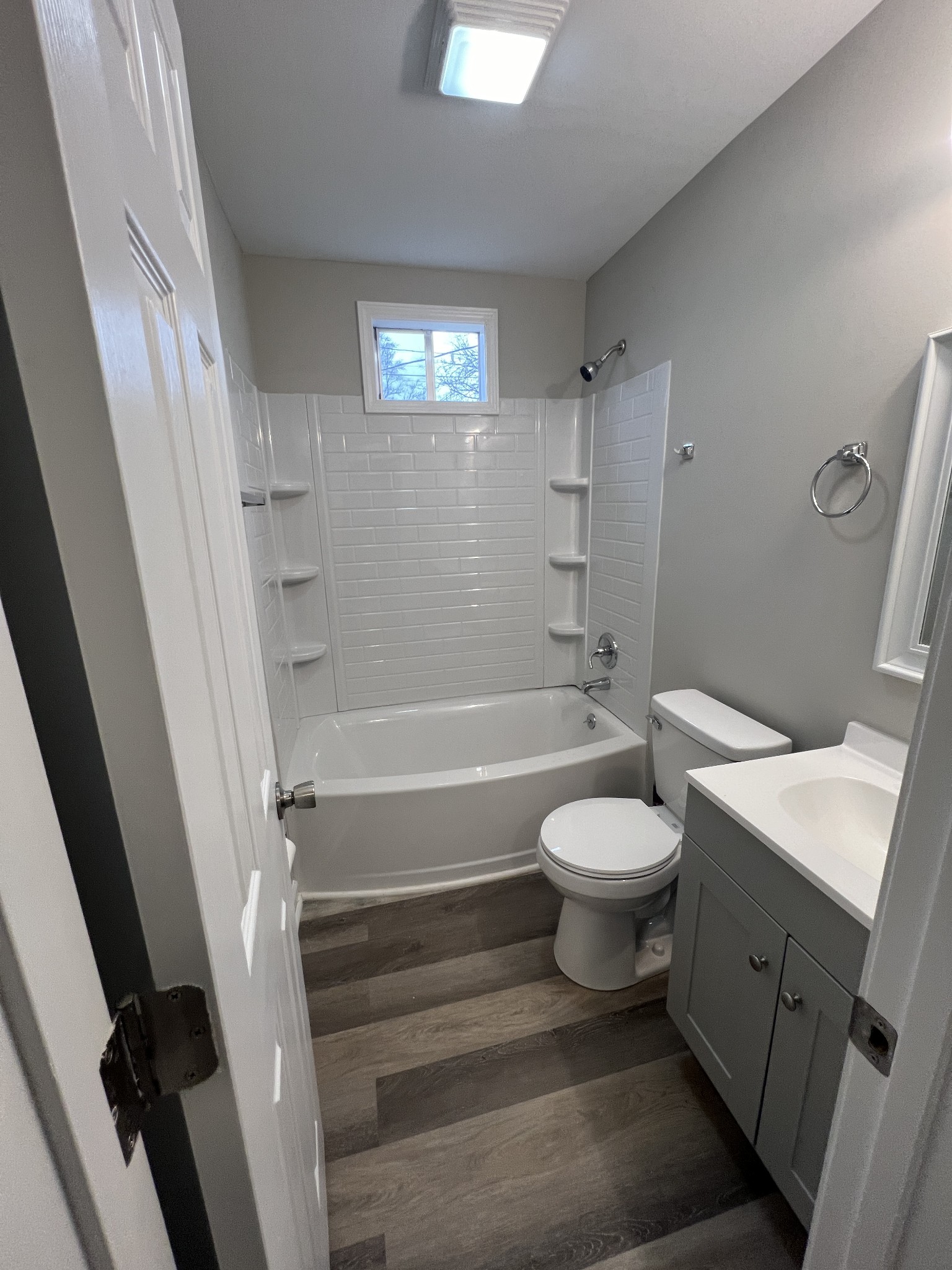 213 Notgrass Road Clarksville, TN 37042 - Photo 9 of 12 a bathroom with a toilet sink and shower