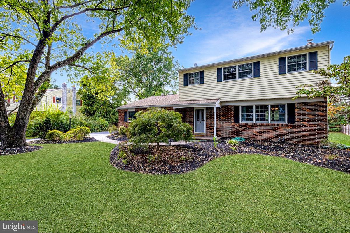 46 Hickory Lane Chalfont, PA 18914 - Photo 2 of 36 a front view of a house with a garden