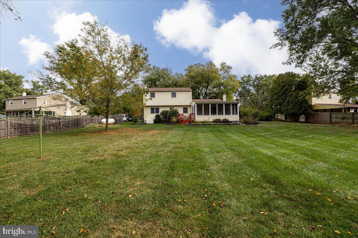 46 Hickory Lane Chalfont, PA 18914 - Photo 34 of 36 a view of a house with a big yard and large trees