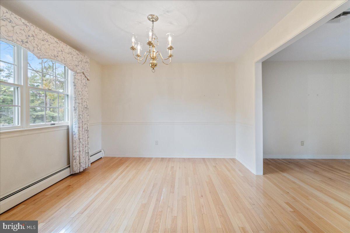 46 Hickory Lane Chalfont, PA 18914 - Photo 5 of 36 wooden floor in an empty room with a window