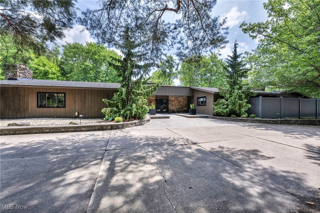 13079 Falling Water Road Strongsville, OH 44136 - Photo 2 of 50 Mid-century inspired home with a chimney