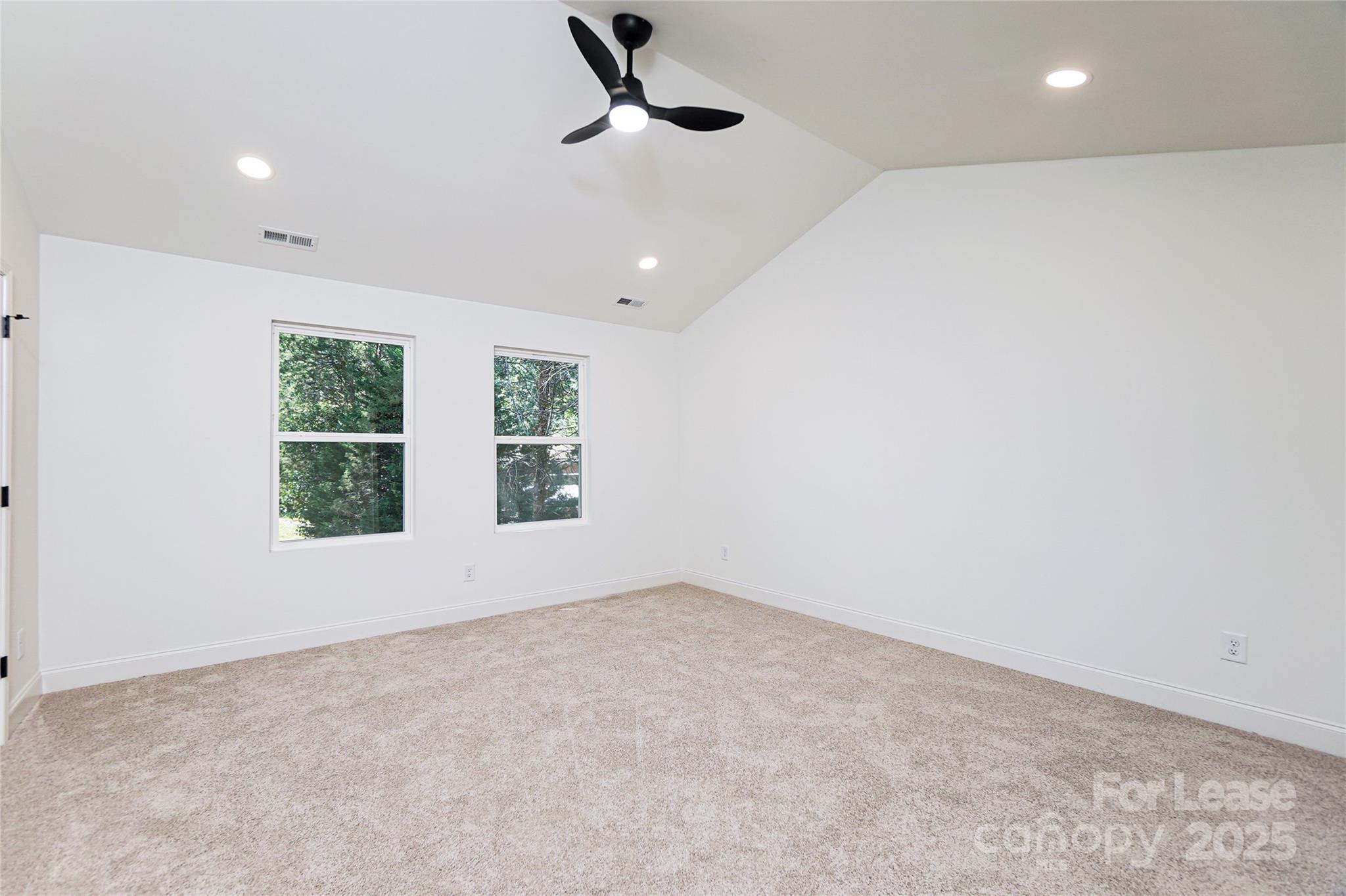 3222 Sam Wilson Road Charlotte, NC 28214 - Photo 14 of 31 an empty room with a window
