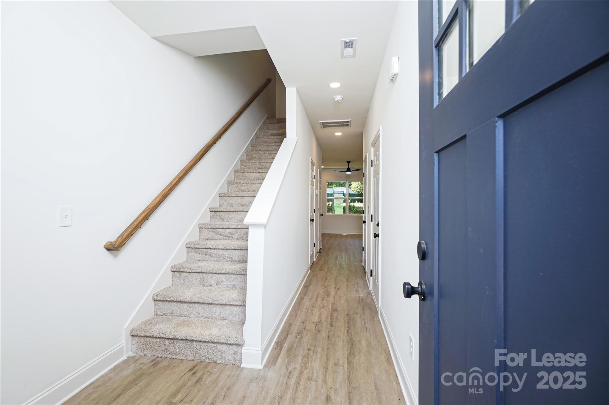 3222 Sam Wilson Road Charlotte, NC 28214 - Photo 2 of 31 a view of entryway with wooden floor