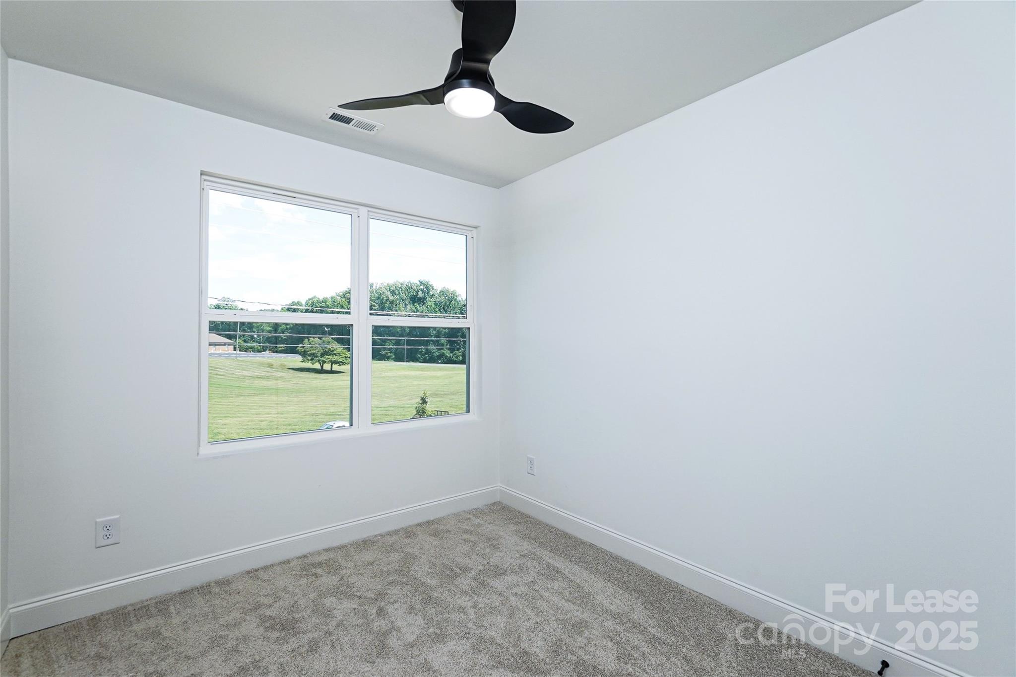 3222 Sam Wilson Road Charlotte, NC 28214 - Photo 24 of 31 an empty room with a window