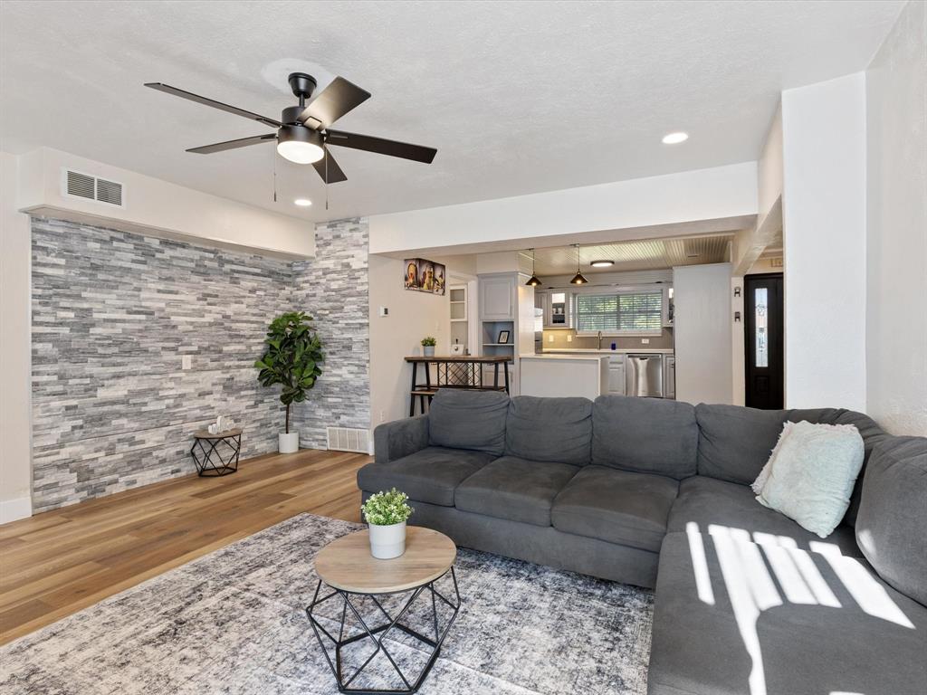 3614 Parader Court Dallas, TX 75228 - Photo 11 of 40 a living room with furniture and a rug