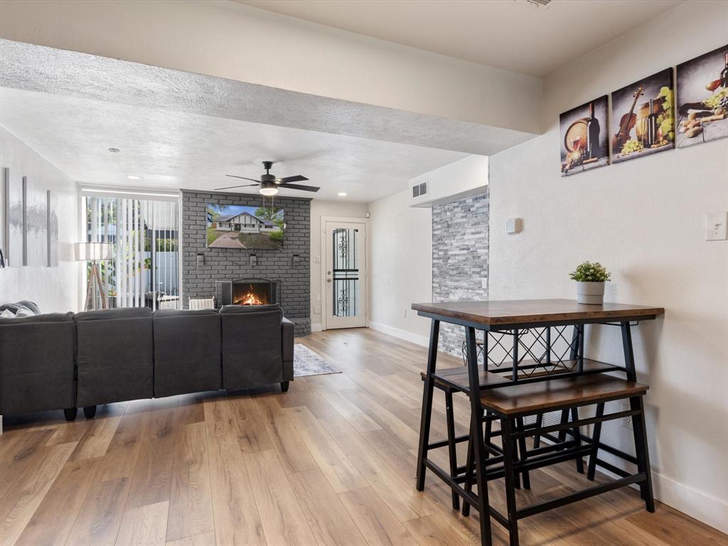 3614 Parader Court Dallas, TX 75228 - Photo 13 of 40 a living room with furniture and a wooden floor