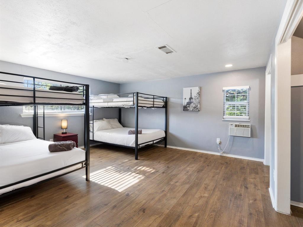 3614 Parader Court Dallas, TX 75228 - Photo 30 of 40 a bedroom with furniture and window