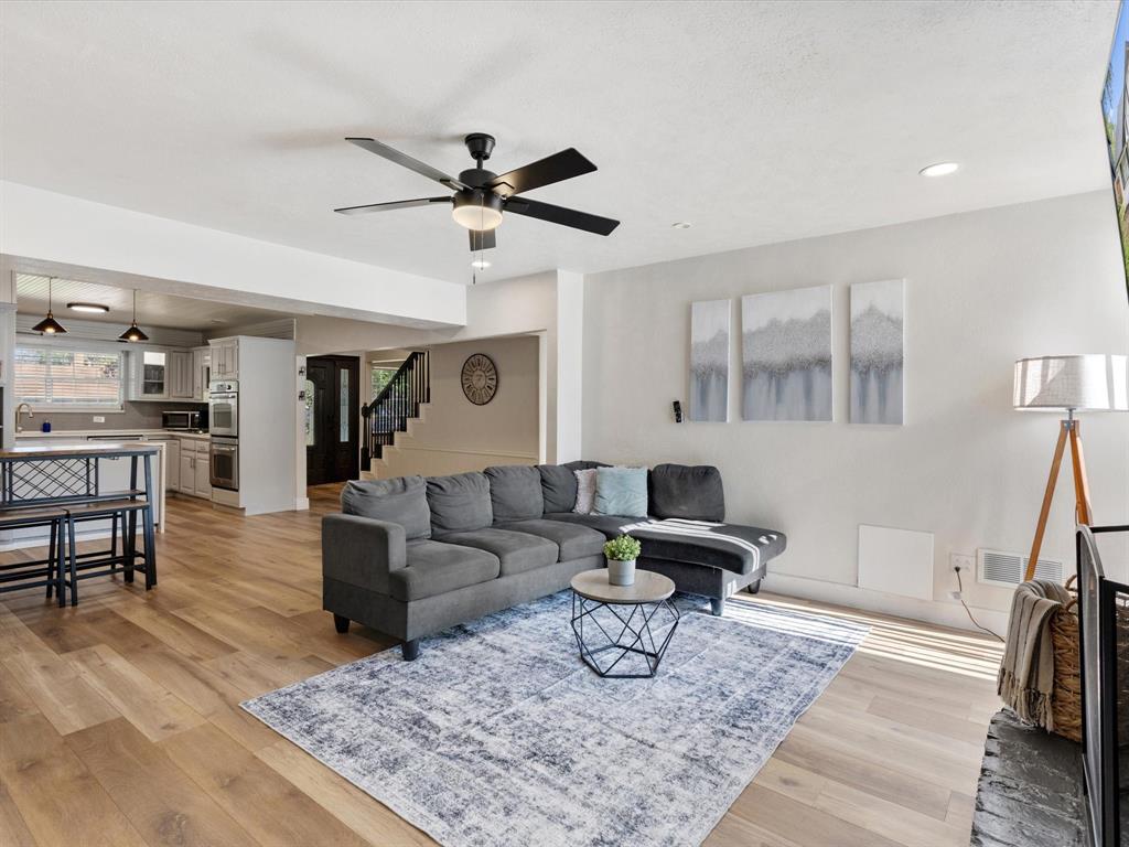 3614 Parader Court Dallas, TX 75228 - Photo 9 of 40 a living room with furniture and a rug