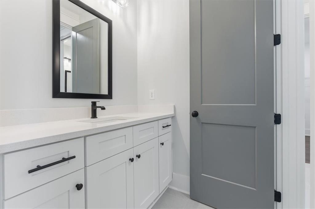 27 Linda Road Southwest Cartersville, GA 30120 - Photo 29 of 51 a bathroom with a sink and mirror