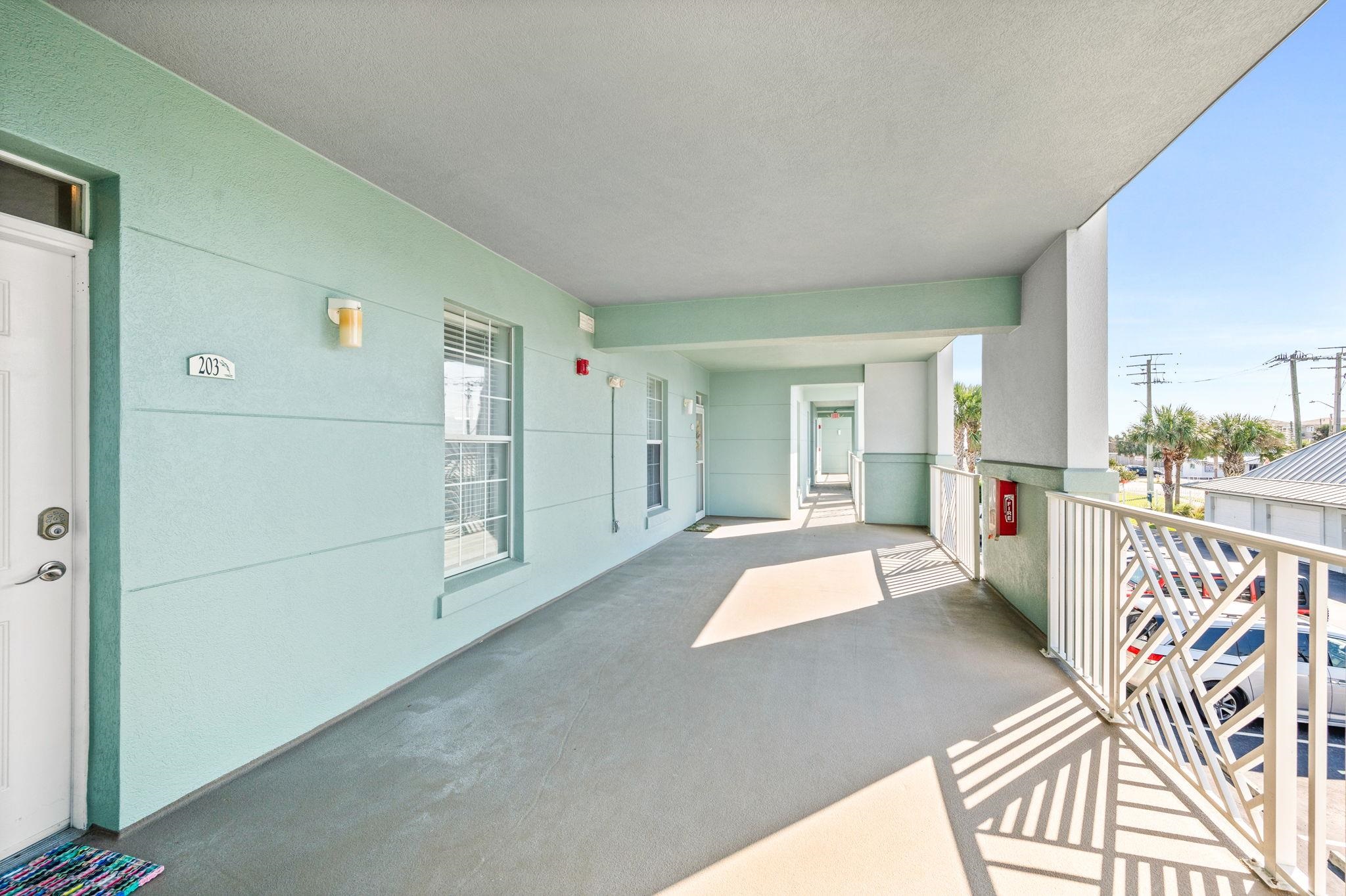 285 Atlantis Circle, Unit 203 St. Augustine, FL 32080 - Photo 4 of 71 a living room with furniture and a table