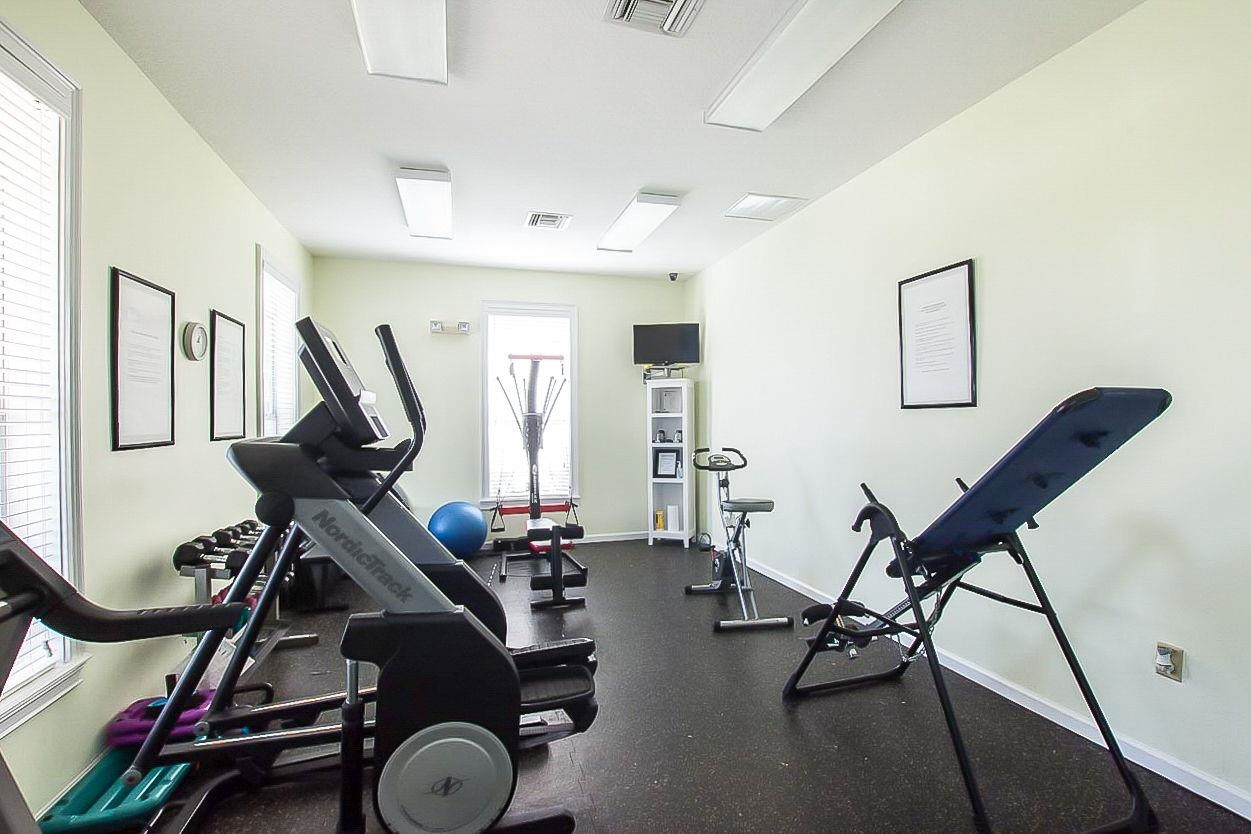 285 Atlantis Circle, Unit 203 St. Augustine, FL 32080 - Photo 57 of 71 a view of a room with gym equipment