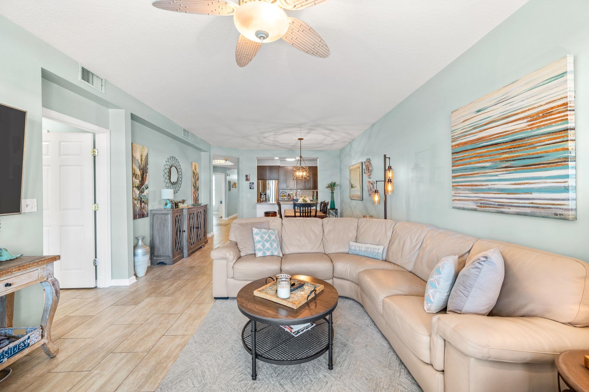 285 Atlantis Circle, Unit 203 St. Augustine, FL 32080 - Photo 9 of 71 a living room with furniture and a large window