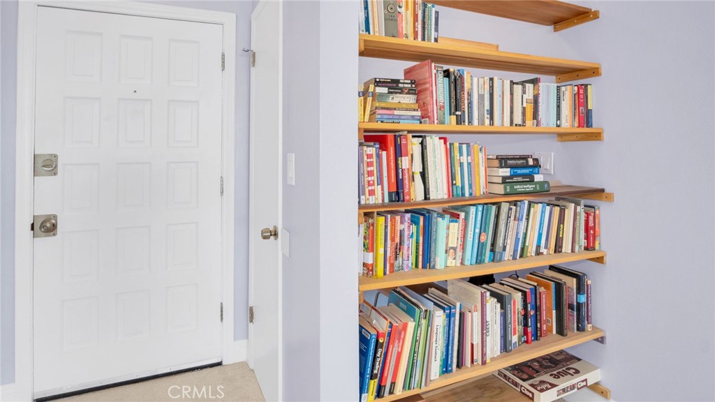10725 Ohio Avenue, Unit 301 Los Angeles, CA 90024 - Photo 13 of 39 a bookshelf with wooden floor in a book shelf