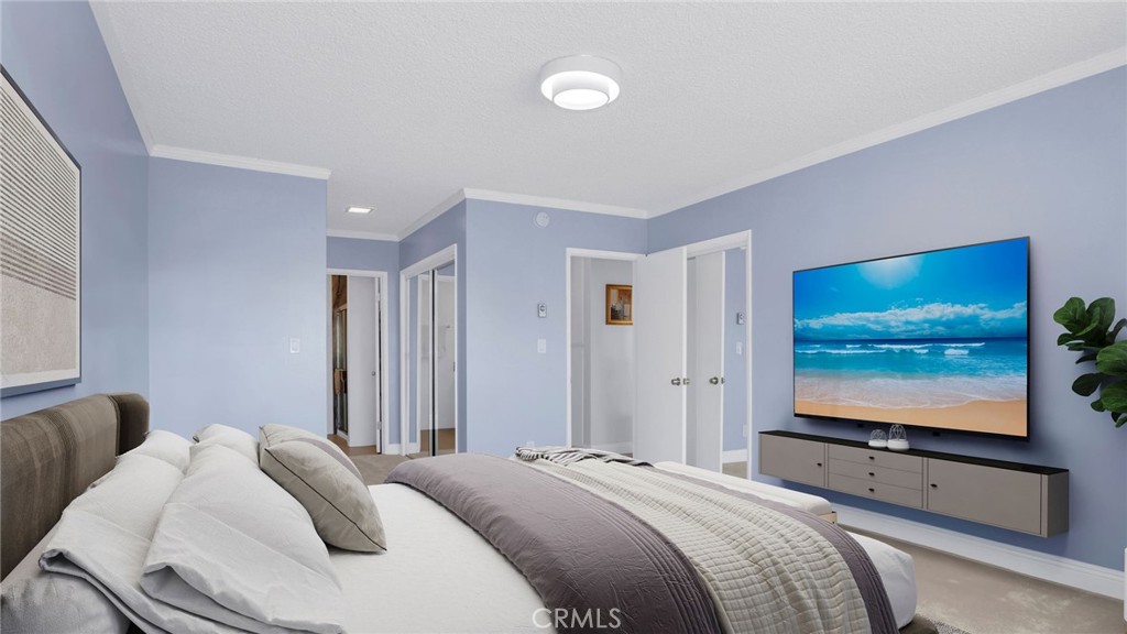 10725 Ohio Avenue, Unit 301 Los Angeles, CA 90024 - Photo 18 of 39 a bedroom with a bed and flat screen tv