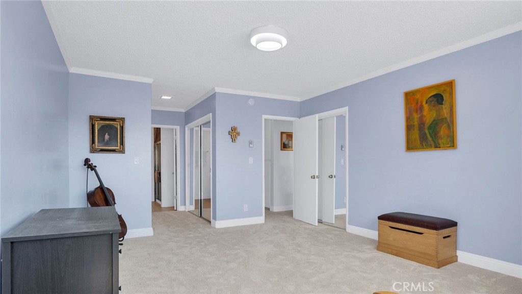 10725 Ohio Avenue, Unit 301 Los Angeles, CA 90024 - Photo 21 of 39 a view of a livingroom with a furniture and staircase