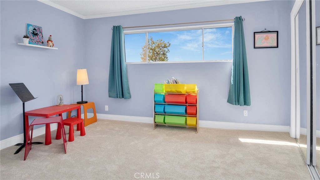 10725 Ohio Avenue, Unit 301 Los Angeles, CA 90024 - Photo 28 of 39 a view of game room with windows and chairs