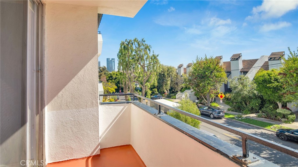 10725 Ohio Avenue, Unit 301 Los Angeles, CA 90024 - Photo 36 of 39 a view of a balcony and trees