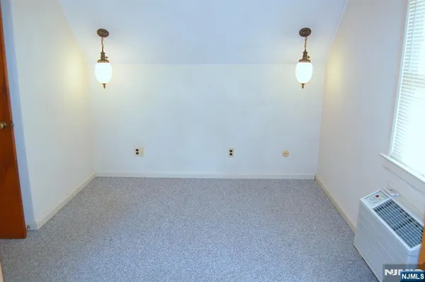 a view of a small space with a window