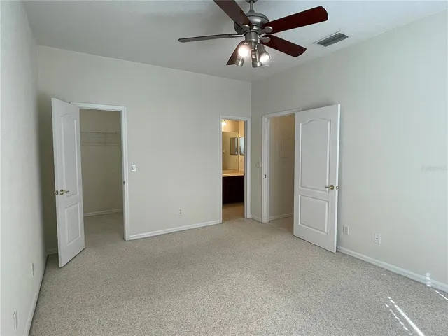 a view of a room with racks on the wall