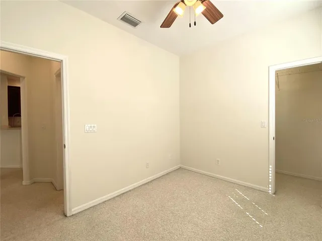 a bathroom with a sink mirror toilet and bathtub