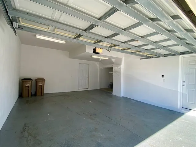 a view of swimming pool with seating space