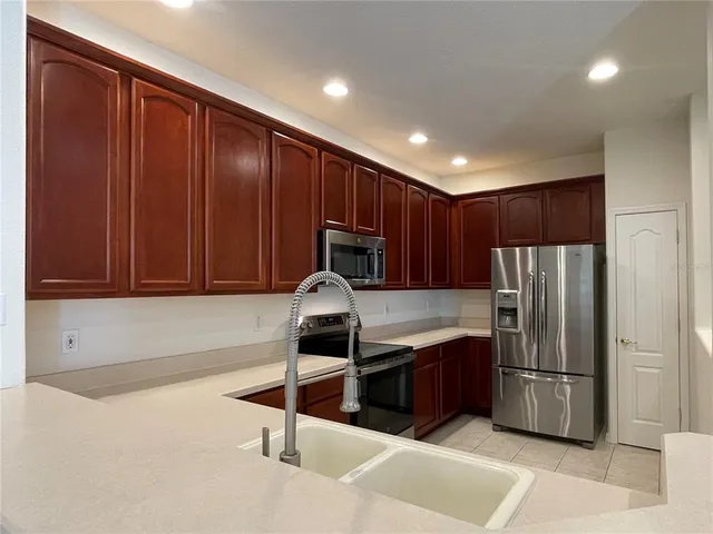 a view of a hallway with windows