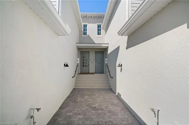 a view of a hallway with entryway