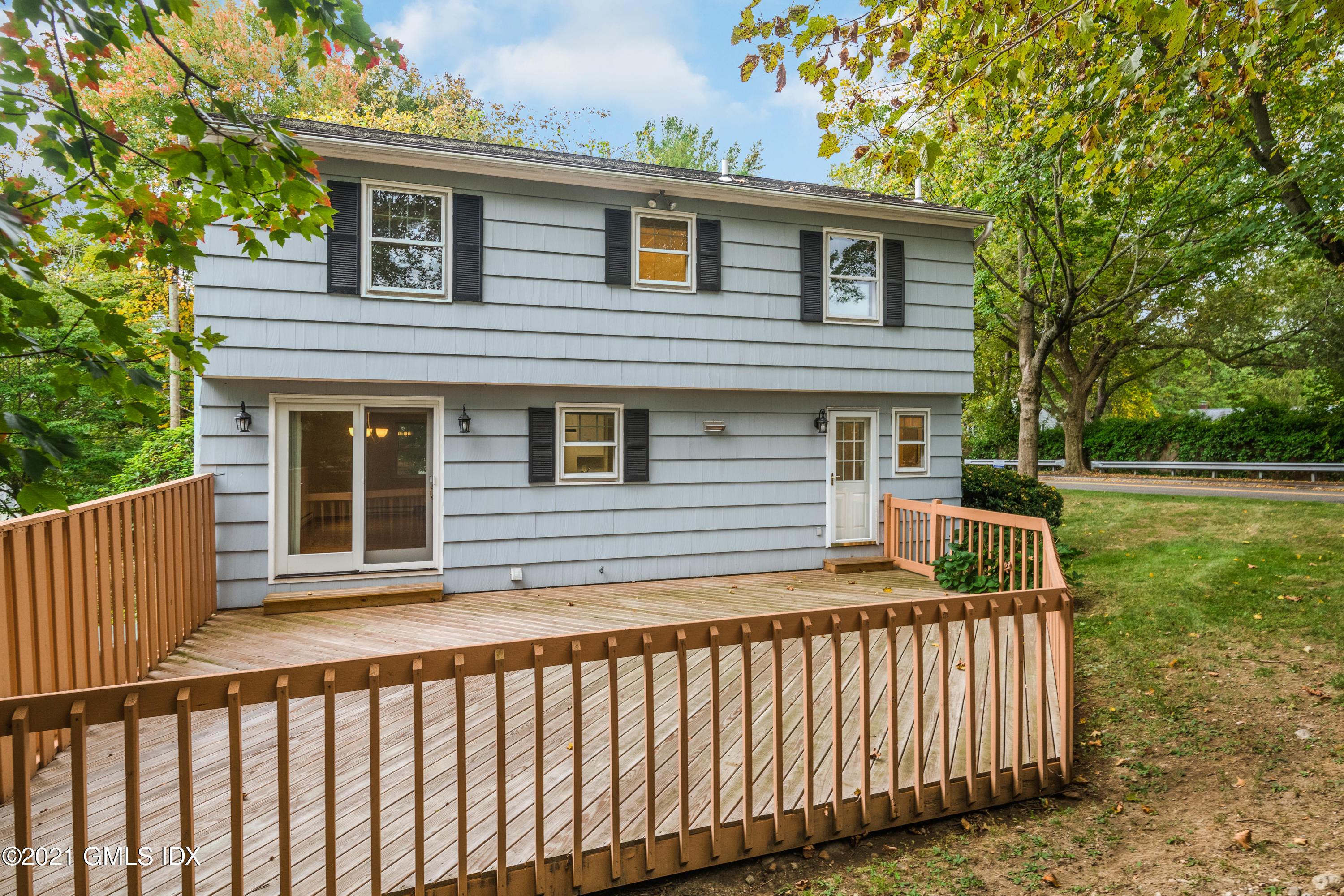 30 Pleasant Street Riverside, CT 06878 - Photo 2 of 19 a view of a house with a deck