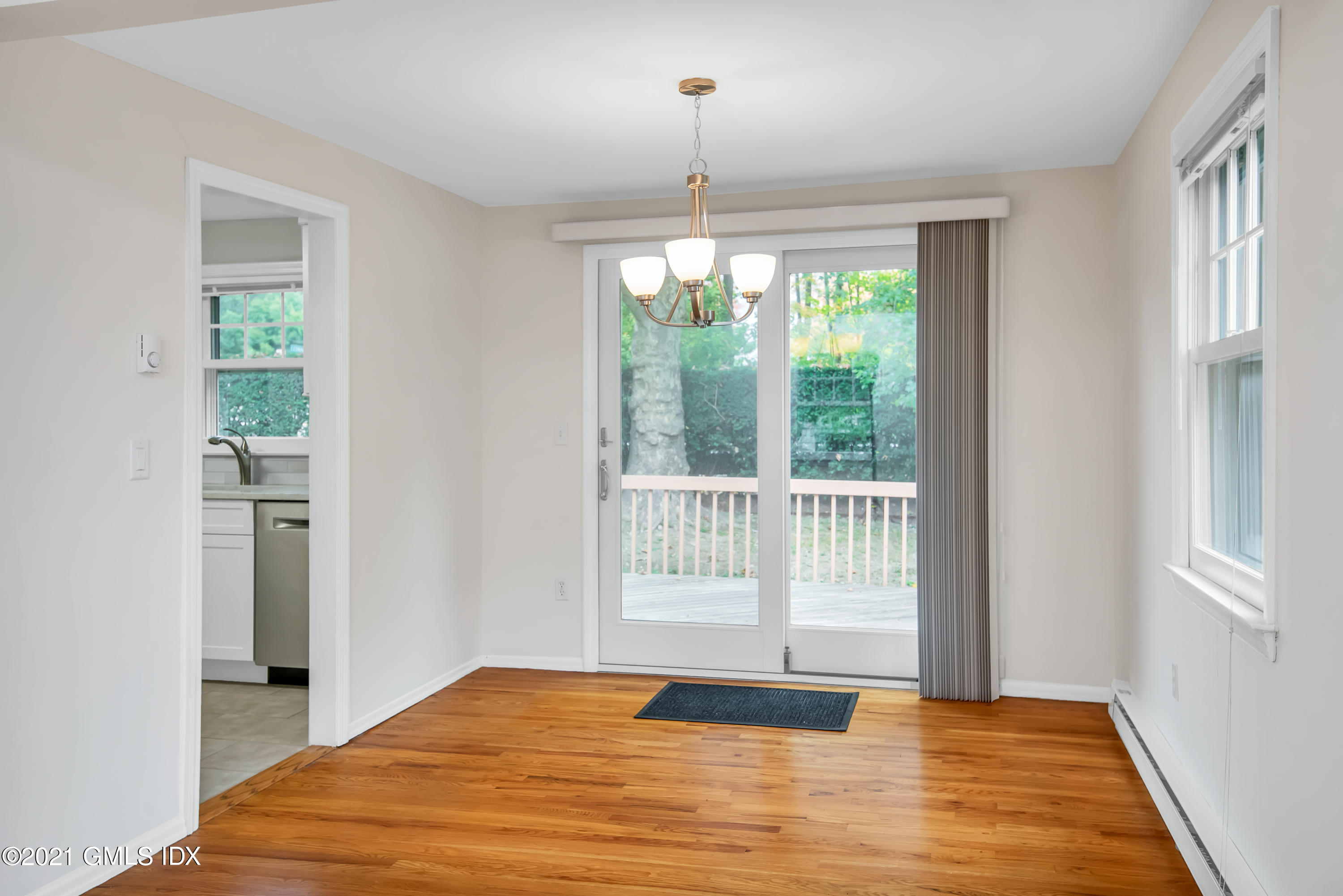 30 Pleasant Street Riverside, CT 06878 - Photo 5 of 19 a bedroom with a bed and a window