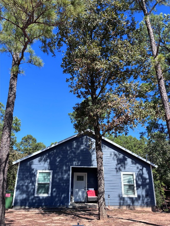 1135 Red Fox Road La Grange, TX 78945 - Photo 1 of 32 a front view of a house with a tree